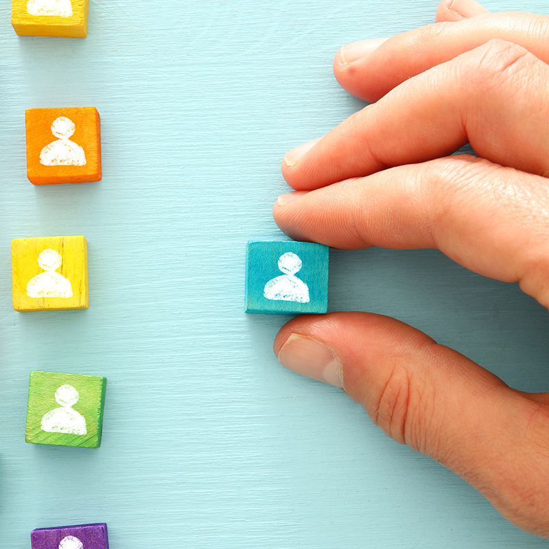 image of colorful blocks with people icons over wooden table ,human resources and management concept.